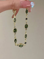 gold-tone green gemstone bracelet