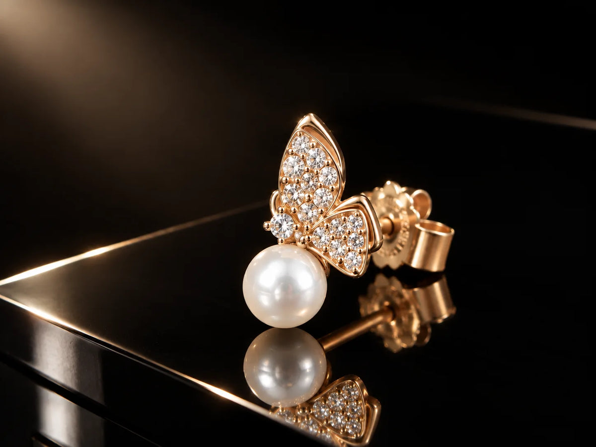 Crystal butterfly stud earrings with pearls