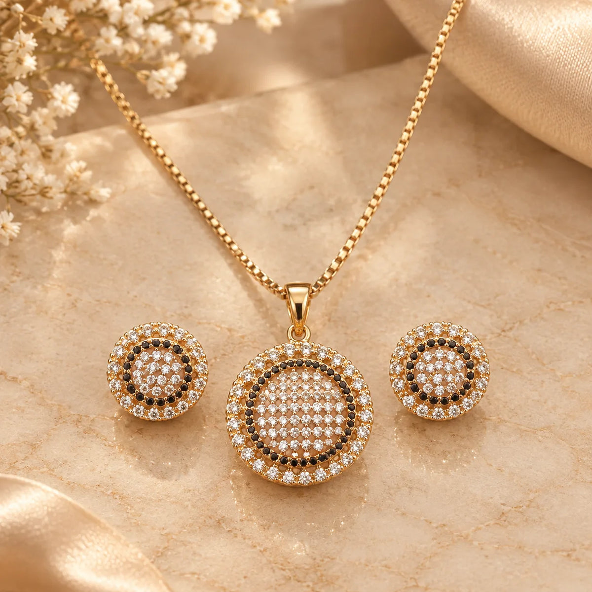 Gold crystal pendant necklace set with earrings