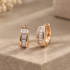 Golden rectangular crystal huggie hoops