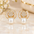 Golden fan earrings with pearl drops
