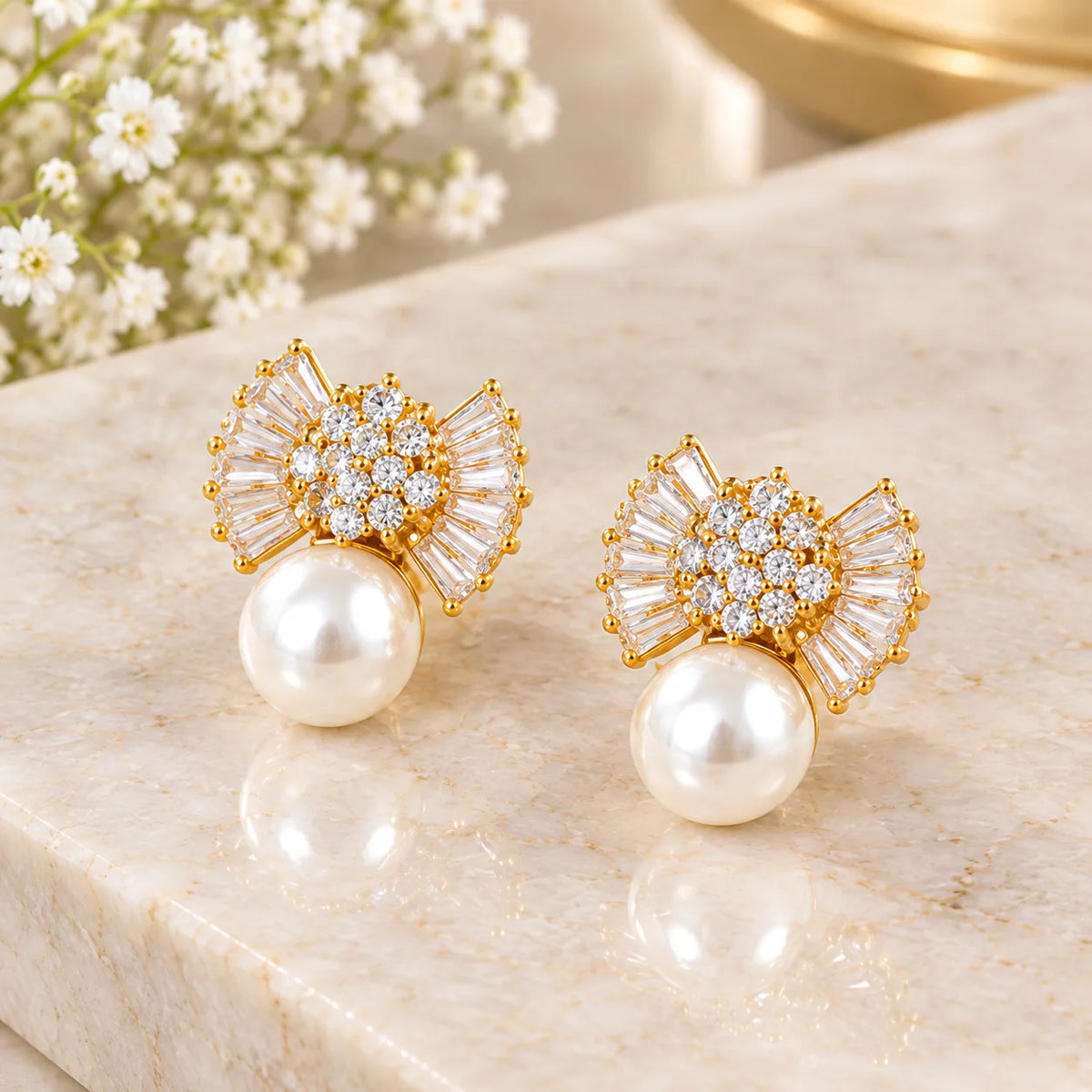 Crystal fan studs with white pearls
