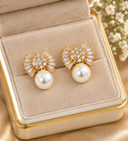 Gold-tone statement earrings with pearl accents