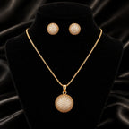 Matching spherical stud earrings