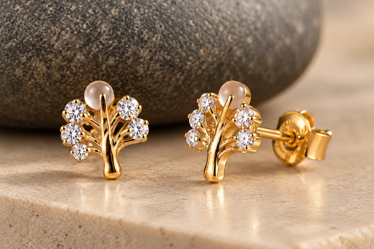 Nature-inspired gold studs with pearl accents