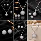 Round crystal pendant with matching studs