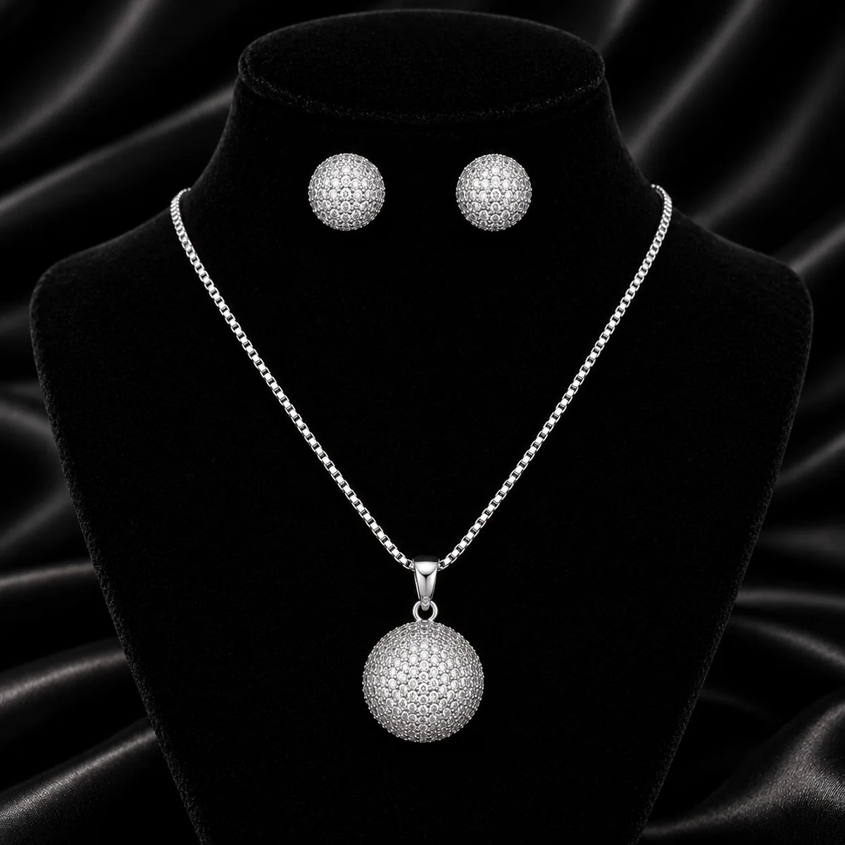 silver-tone necklace and earring set