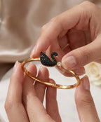 Black Swan Charm Bracelet for Women – Gold-Tone Pearl Detail Jewelry