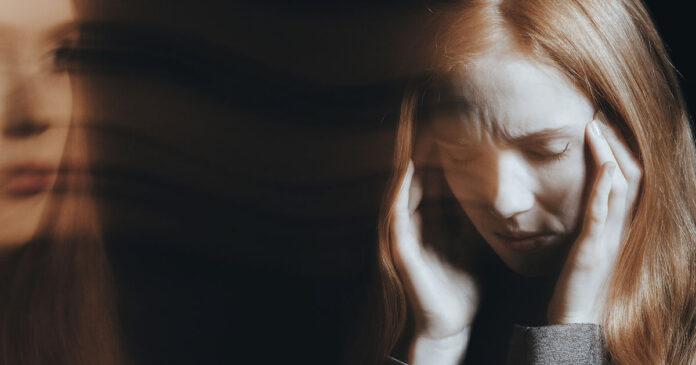 Young woman experiencing hallucinations