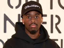 Kai Cenat Went Analog With This Unexpected Fashion Week Accessory — See Photos