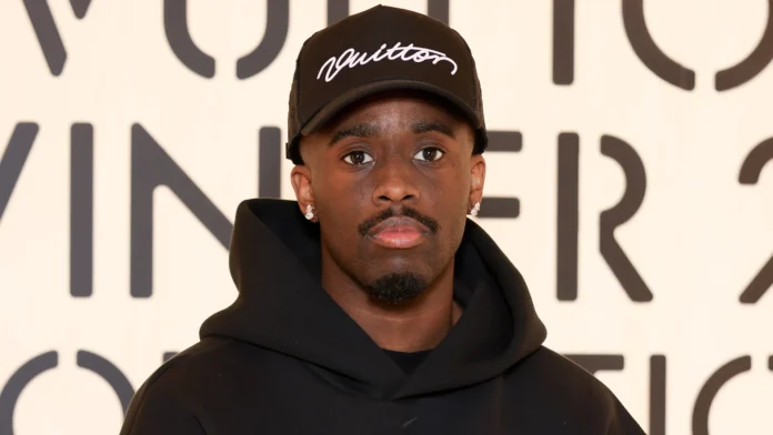 2257286189 Kai Cenat Went Analog With This Unexpected Fashion Week Accessory — See Photos