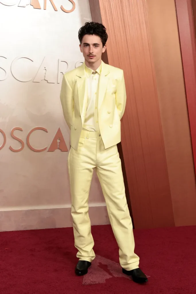 Timothée Chalamet wearing a yellow Givenchy suit at the 2025 Oscars.

(Image credit: Getty Images)
