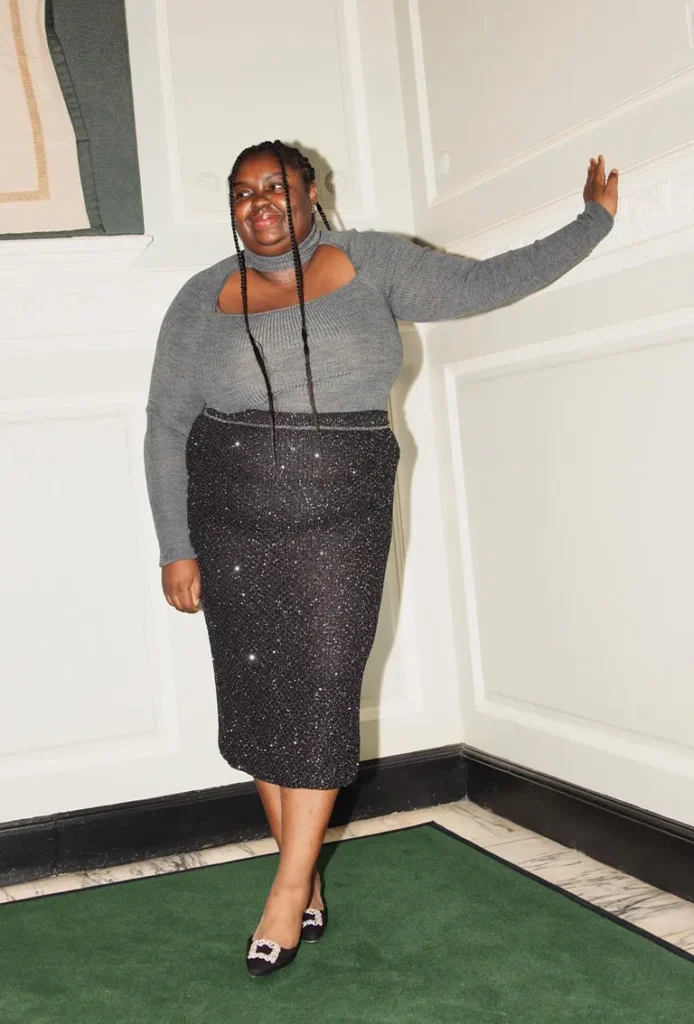 A New Look Women's Plus Size Black Midi Skirt, with a bias cut and striped pattern.