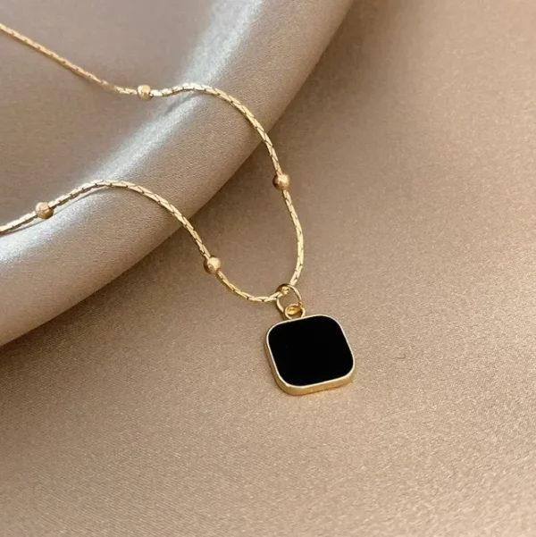 Elegant black pendant chain side angle view