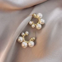 Elegant metal inlaid pearl earrings side view
