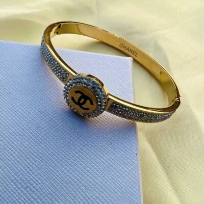 Women gold CC bangle lifestyle shot