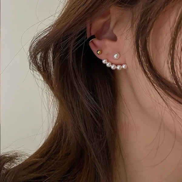 Side angle view of romantic pearl earrings fashion jewelry