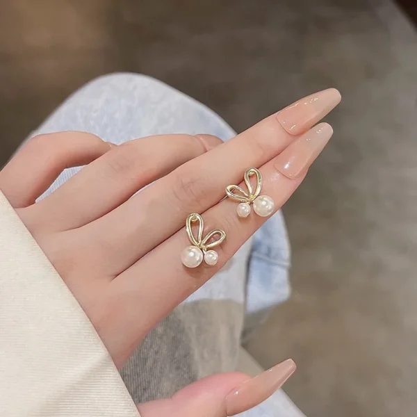 Golden bow earrings for girls fashion accessory