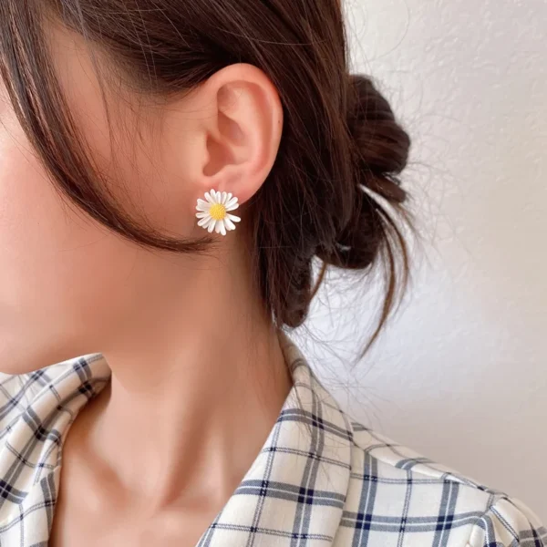 Women wearing Korean fashion daisy earrings
