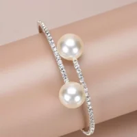 Rhinestone and faux pearl cuff bangle