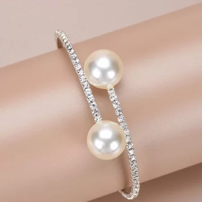 Rhinestone and faux pearl cuff bangle